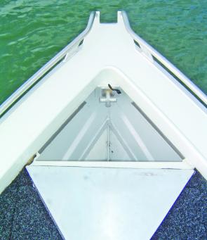 The anchoring system is simplicity personified, with an internal cross bollard and the anchor rope feeding out over the bowsprit between the low profile bowrails.